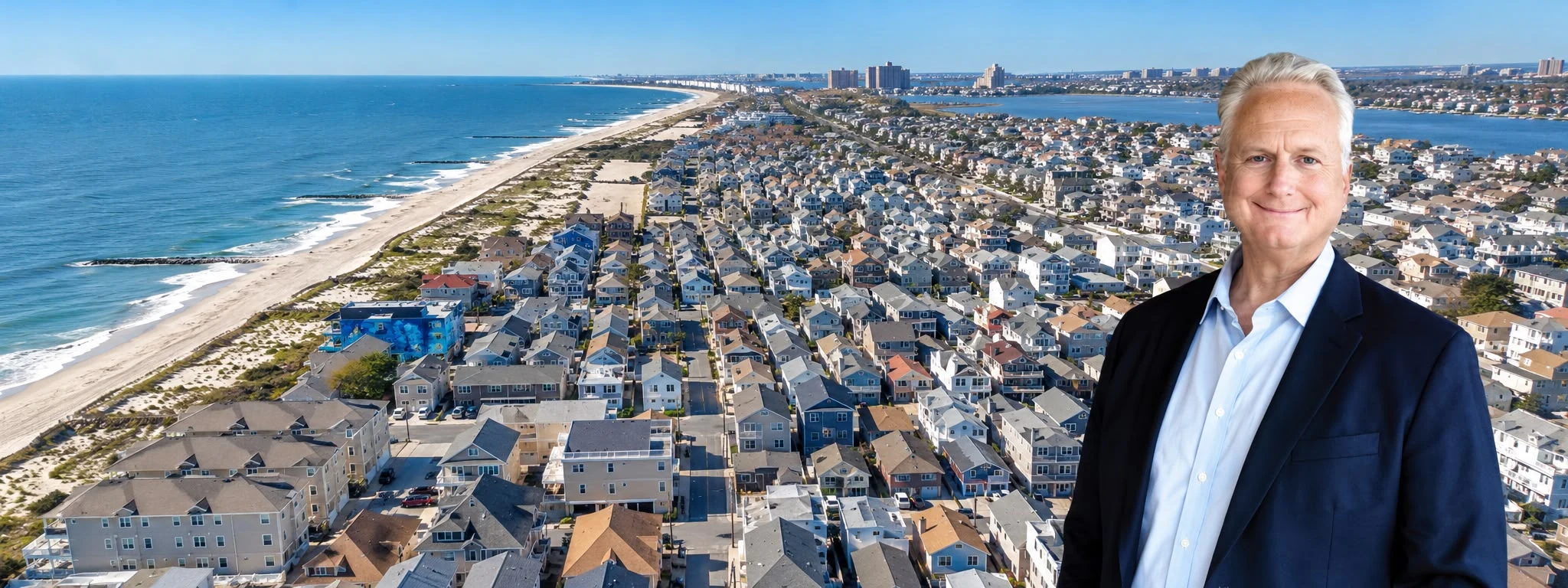 Michael Hastava pictured on the right of a Long Island coastal panorama